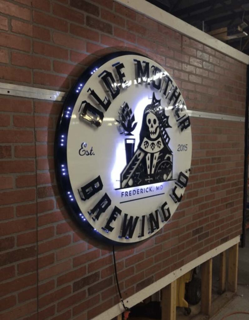 unlit Olde Mother Brewing Co. sign