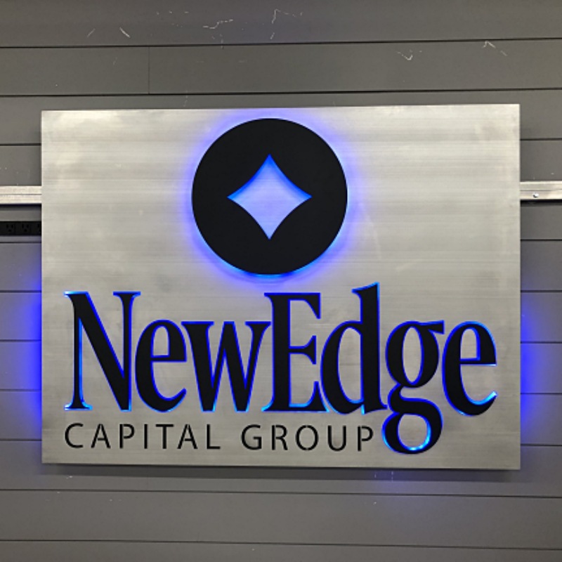 New Edge Wealth custom brush aluminum sign