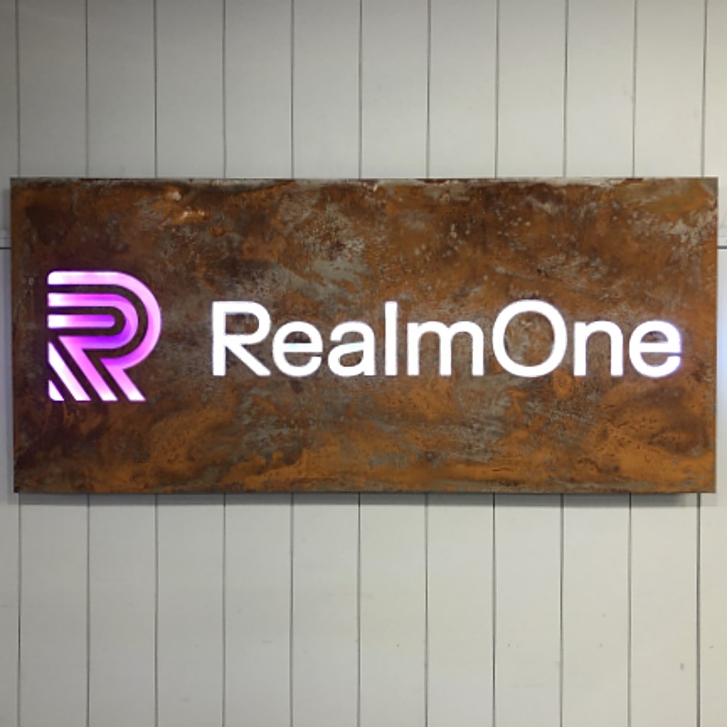 RealmOne single layer custom distressed steel sign