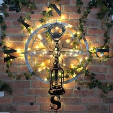 a custom 3D compass sign created by ShieldCo