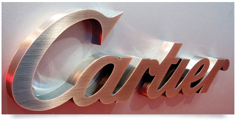 copper Cartier sign