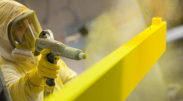 a custom sign being power coated by a professional