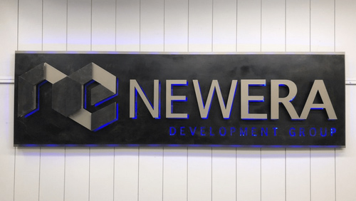 a premium metal sign that was made for newera