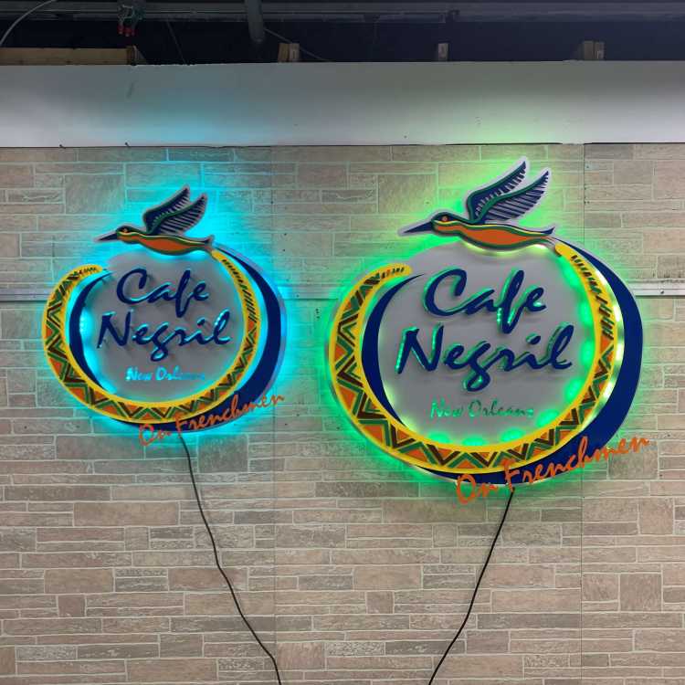 custom illuminated sign for the cafe negril in new orleans