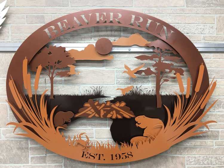 custom metal sign in copper and bronze finish for the beaver run