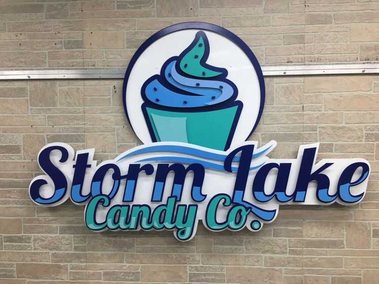 custom illuminated sign for the storm lake candy company