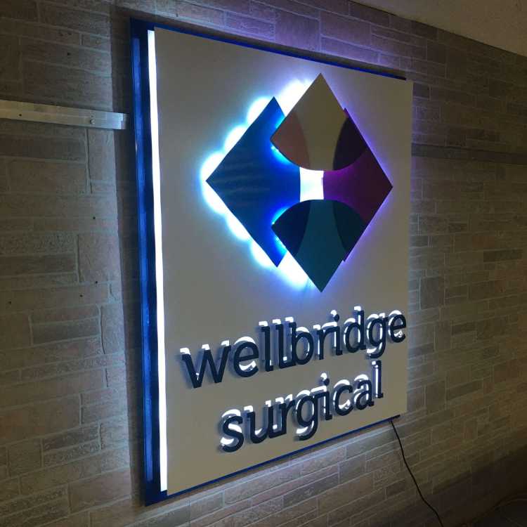 illuminated custom sign for the wellbridge surgical office