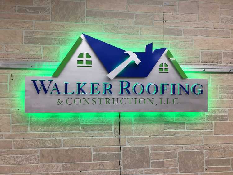 custom illuminated sign for the walker roofing and construction llc in a powder coated and brushed steel finish