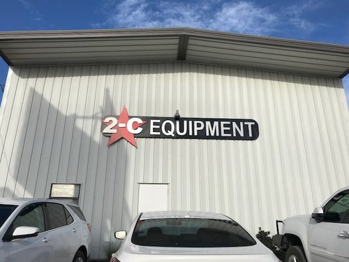 metal sign for 2-C Equipment store