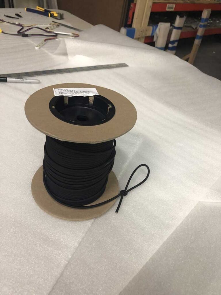 spool of thread used to make PPE masks