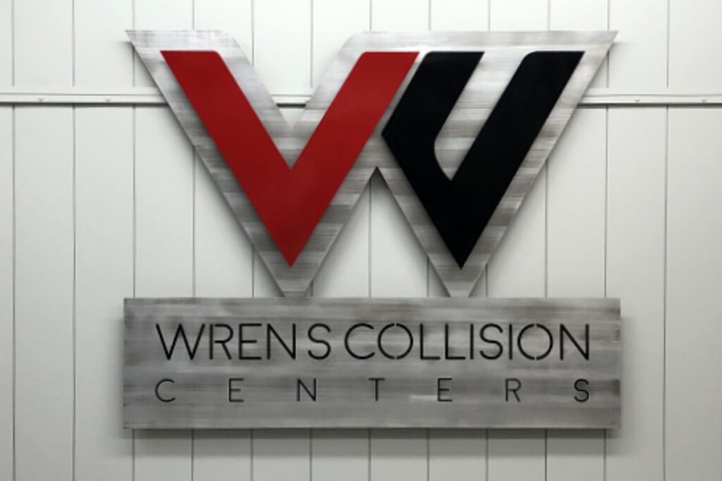 Wren Collision multi layer fabricated halo lit brushed aluminum interior custom office sign