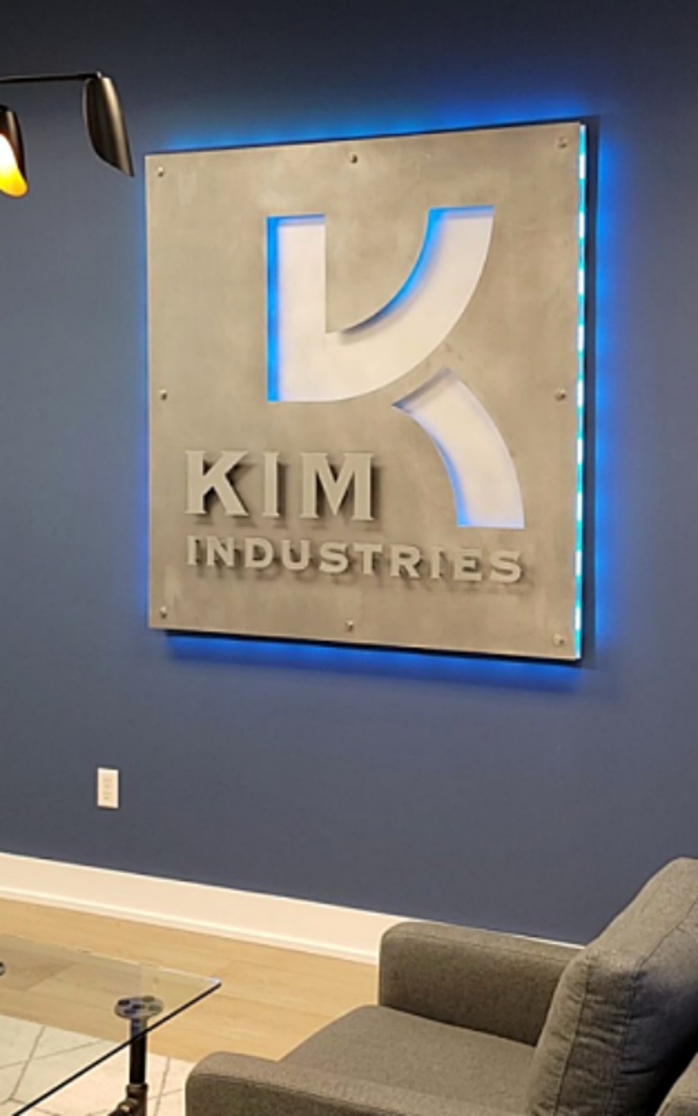 Kim Industries custom metal business sign